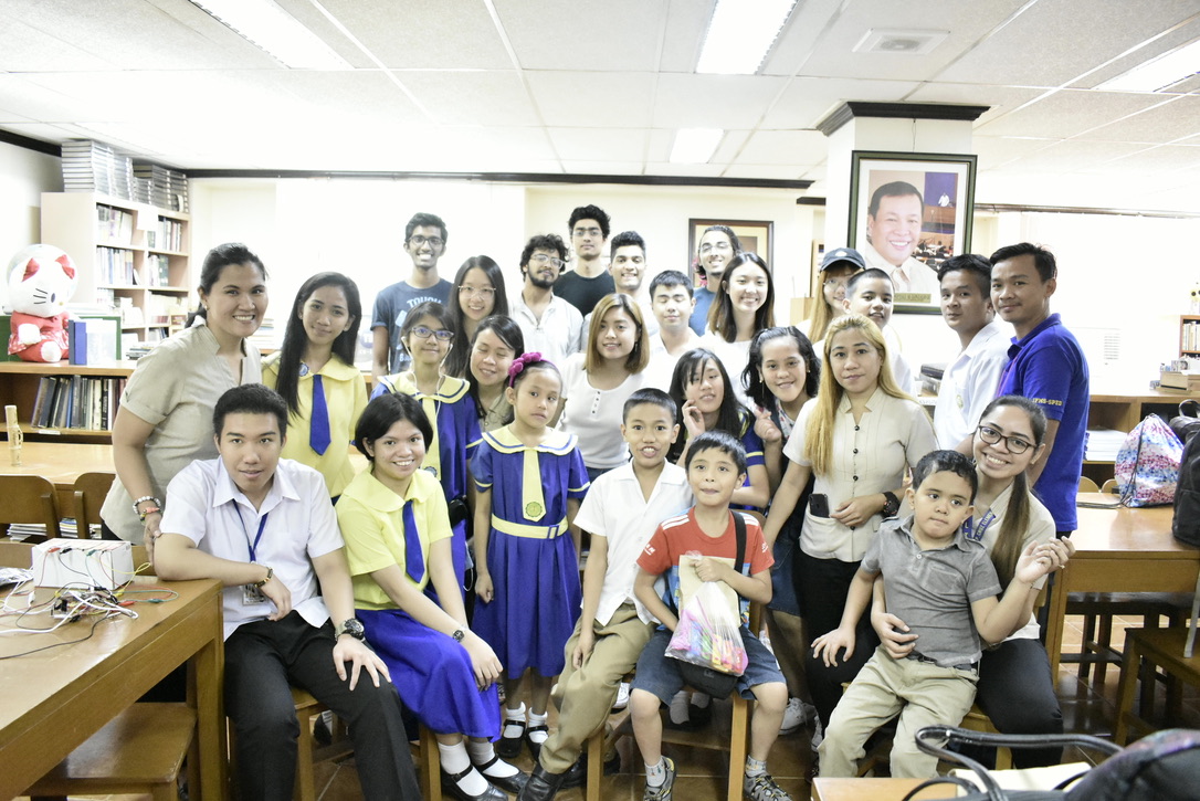 Group photo of students and teachers at the music workshop